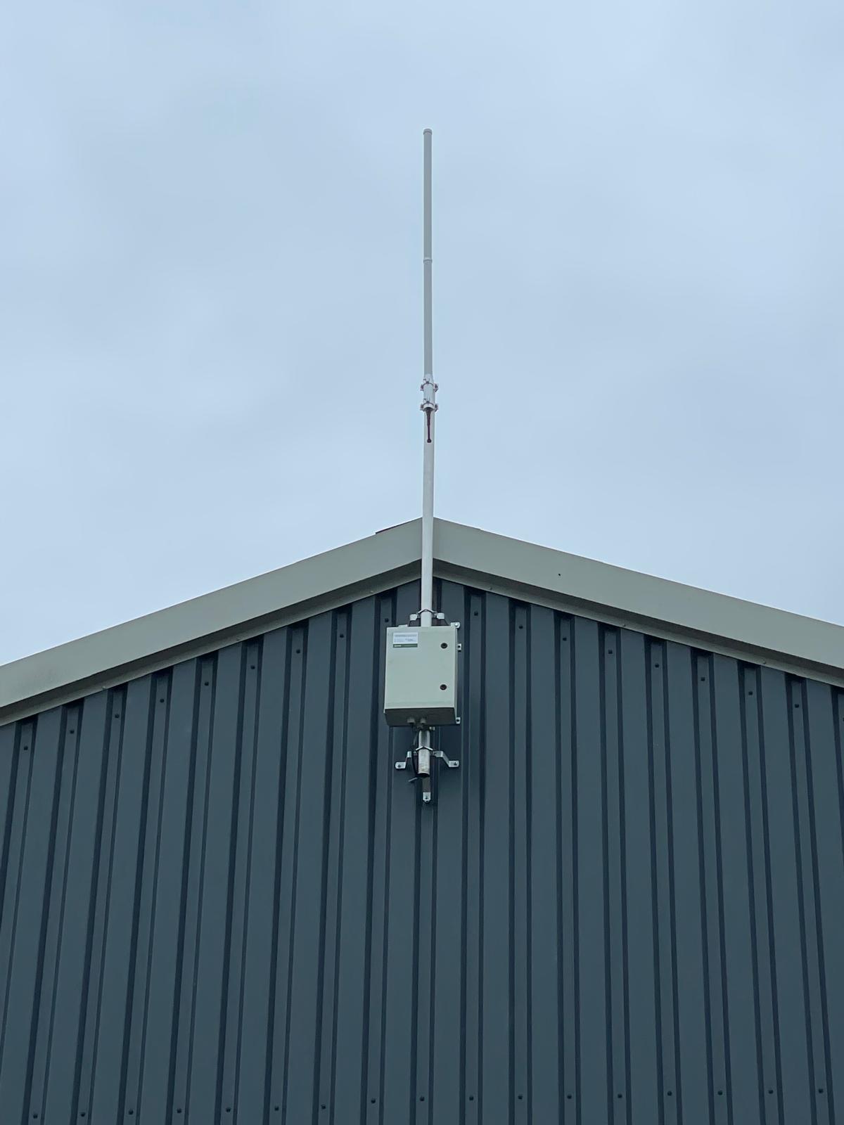 Gateway and antenna mounted on a barn gable wall