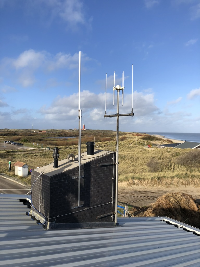 Coastal rooftop gateway with antenna overlooking the sea
