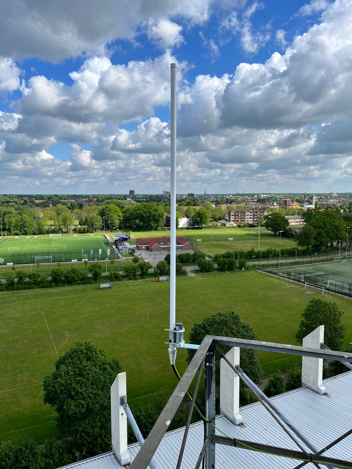 Antenna on a tower overlooking sports fields